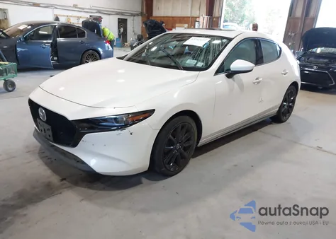 2021 Mazda Mazda3 Hatchback Premium from USA, damaged, VIN JM1BPBML6M1348258